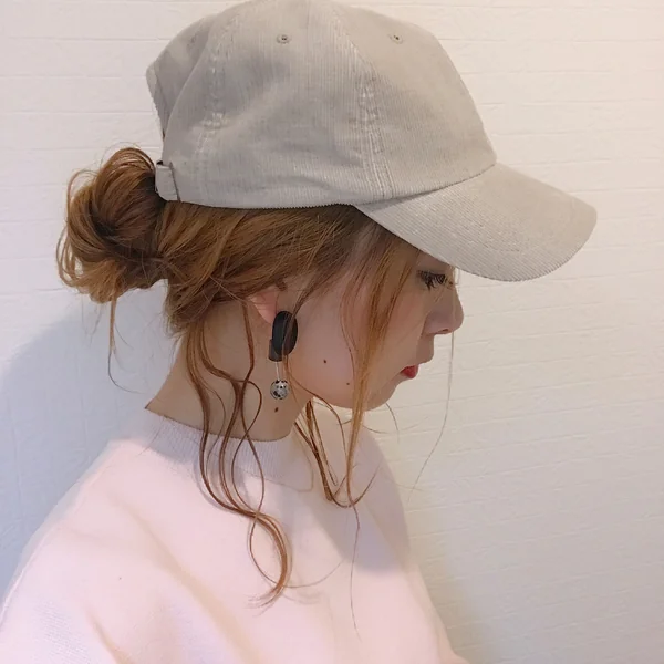 Messy Bun Under Baseball Cap