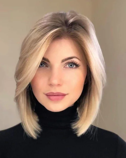 Voluminous Platinum Lob with Deep Side Sweep