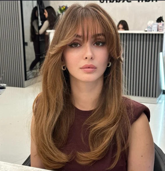 Long Auburn Hair with Side-Swept Bangs