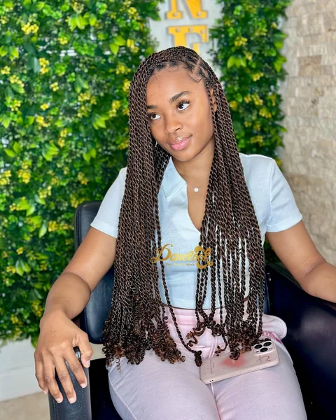 Long Brown Knotless Twists with Curly Tips