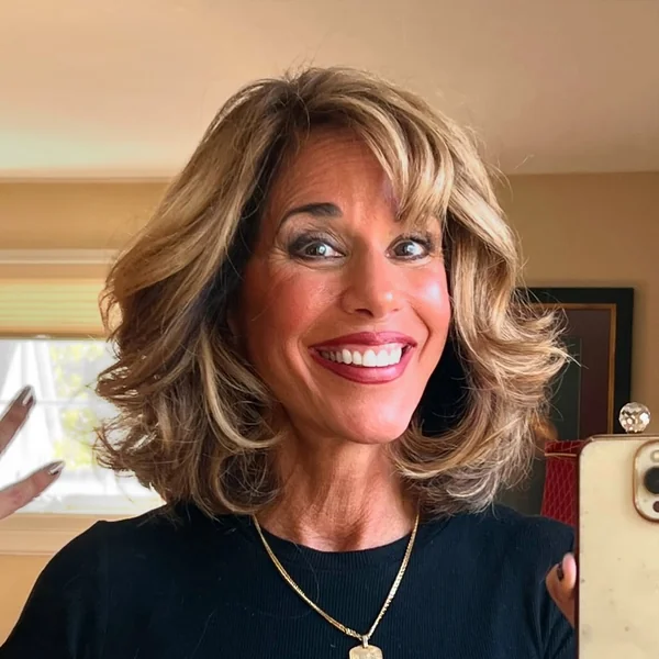 Blonde Layered Shag with Highlights Over 50