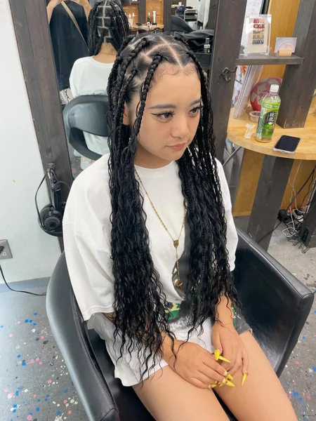 Knotless Box Braids with Curly Ends at Salon