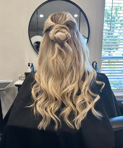 Half Up Knotted Bun on Long Blonde Hair