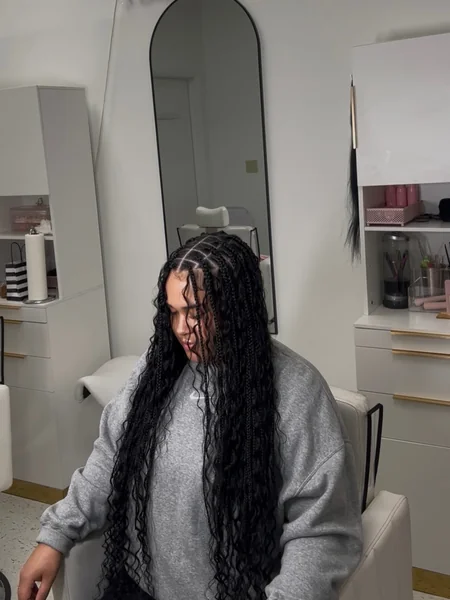 Thick Box Braids with Voluminous Curly Ends
