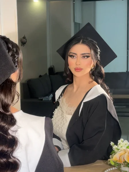 Candid Side-Swept Waves at Graduation