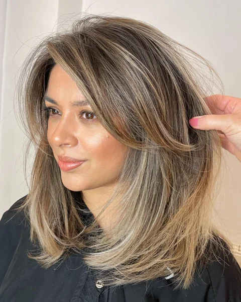 Side Part Medium Highlighted Layered Hair