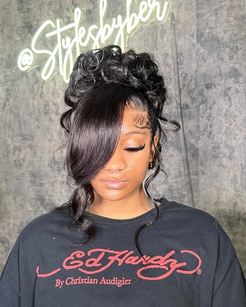 Curly Updo with Side Bang and Wavy Pieces