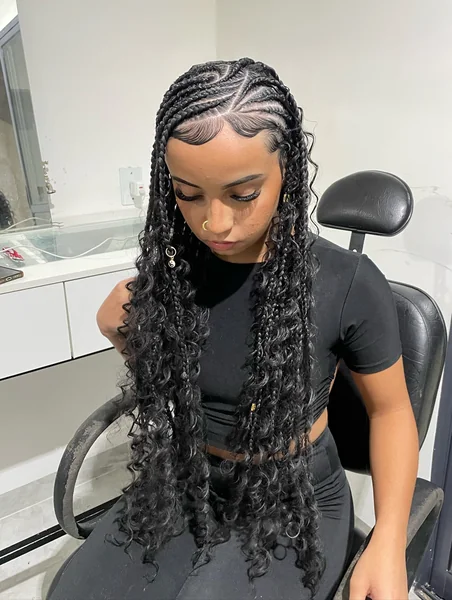 Fulani Braids with Long Curly Ends and Gold Ring Accessories