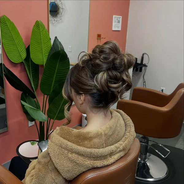 Curly Updo with Twisted Sections