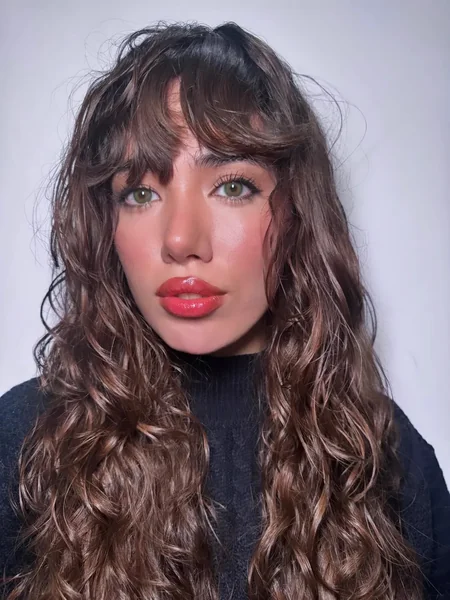 Curly Medium Hair with Wispy Bangs