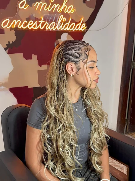 Blonde Fulani Braids with Wavy Curls and Side Part