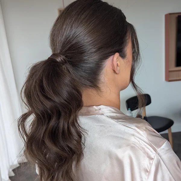 Elegant Low Ponytail with Wavy Ends