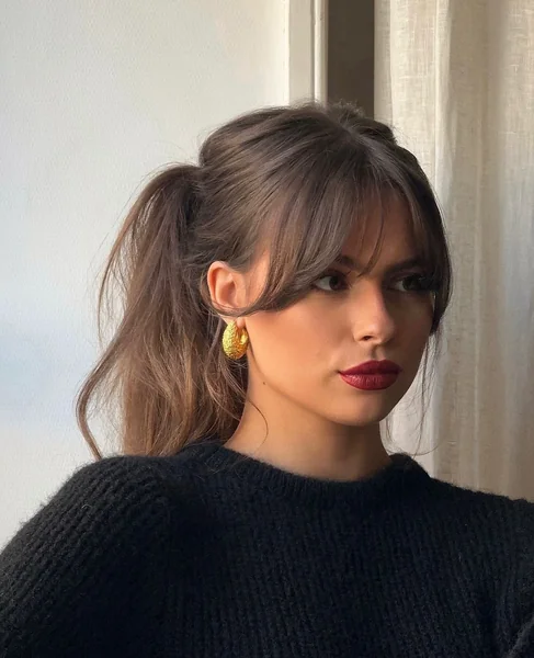 Half-Up Ponytail with Curtain Bangs