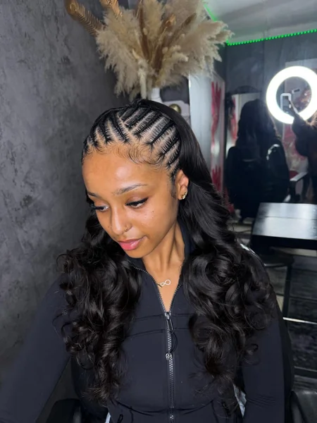 Side-Swept Cornrows with Wavy Extensions