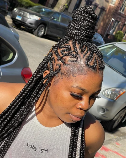 Fulani Braids High Bun Updo with Freestyle Cornrow Design