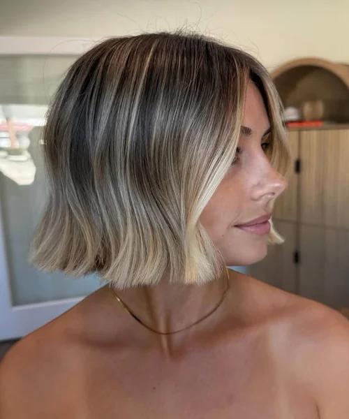 Sleek Ash Blonde Blunt Bob with Face-Framing Highlights
