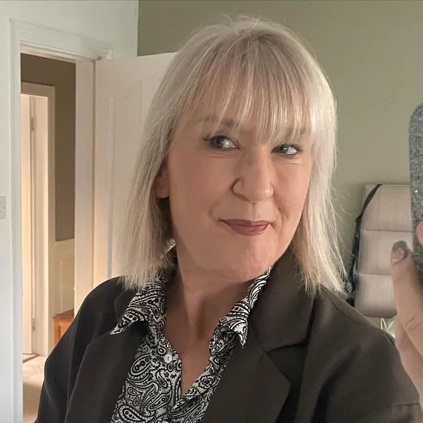 Silver Bob with Straight Bangs Over 60
