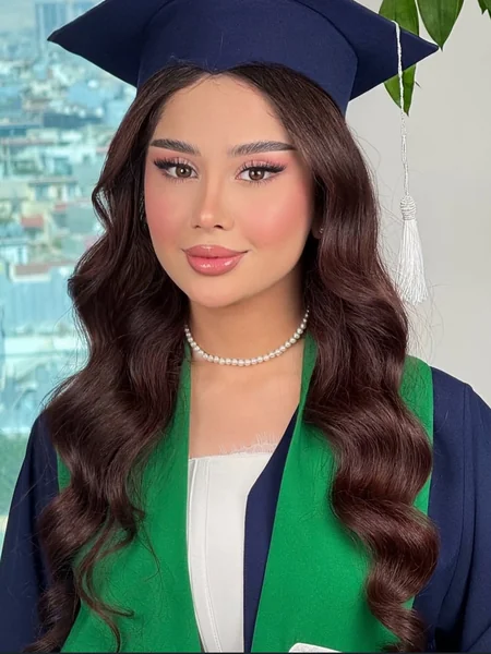 Long Wavy Hair Under Green Gown Cap
