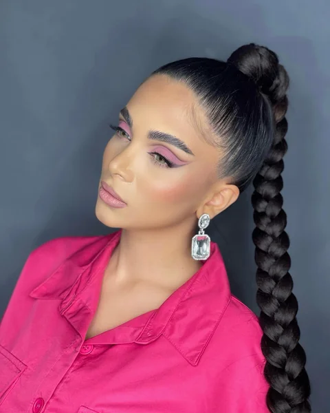 Sleek High Ponytail with Thick Rope Braid