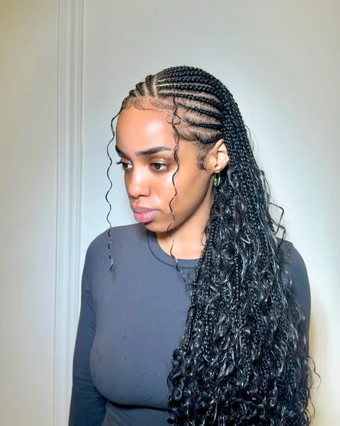 Cornrow Hairstyle with Curly Extensions on Black Women
