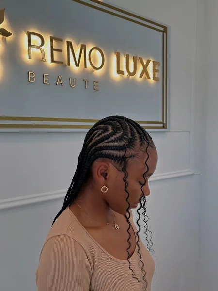 Spiral Cornrow Design into Ponytail on Black Women