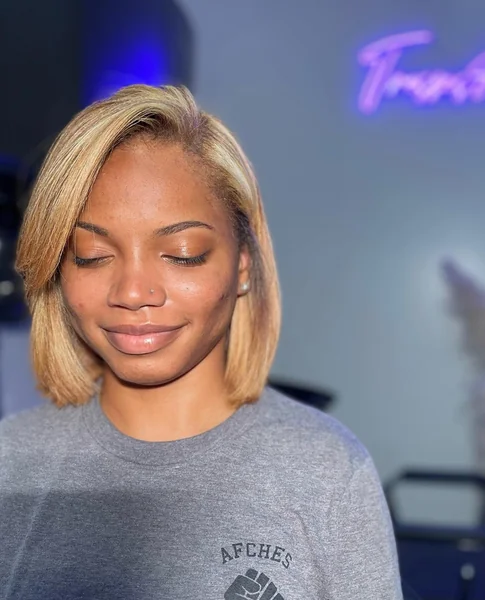 Blonde Asymmetric Bob with Side Part
