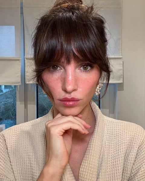 Messy Updo with Curtain Bangs