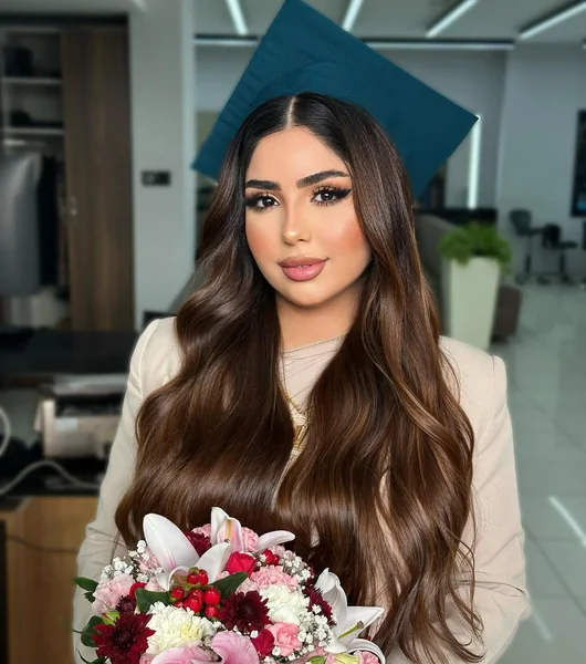 Long Wavy Hair Under Teal Graduation Cap