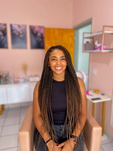 Small Brown Knotless Braids in Salon