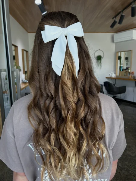 Half-Up Style with White Bow for Graduation