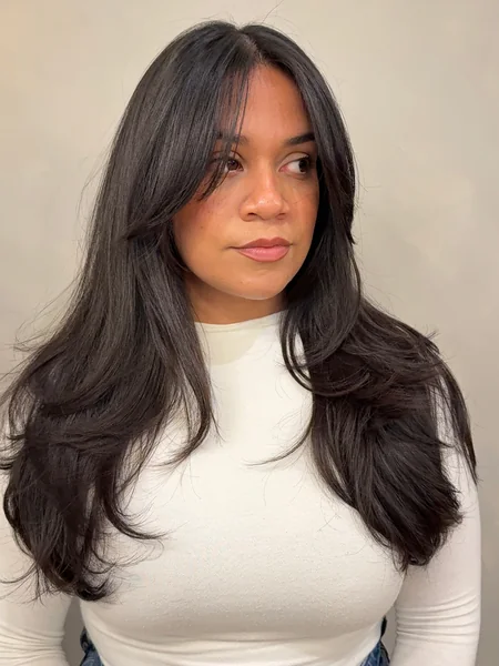 Layered Hair with Side-Swept Bangs