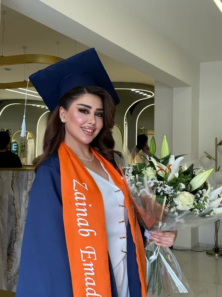 Side Waves Under Navy Cap with Orange Sash