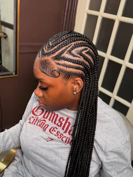 Intricate Geometric Cornrow Ponytail on Black Women