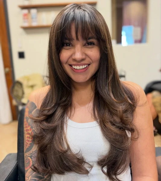Long Dark Brown Voluminous Hair with Curtain Bangs