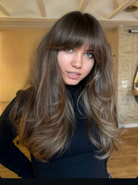 Long Balayage Brunette Wavy Hair with Curtain Bangs