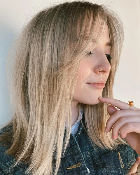 Medium Ash Blonde Hair with Side Bangs