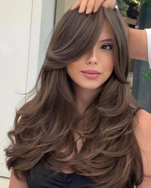 Dramatic Long Side-Swept Fringe