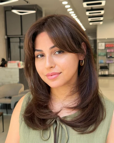 Layered Brown Hair with Side-Swept Bangs