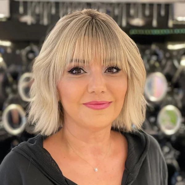 Bright Blonde Textured Bob with Full Fringe