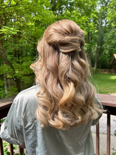 Twisted Half Up on Blonde Wavy Hair Outdoors