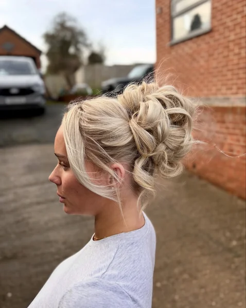 Messy Braided Updo for Short Blonde Hair