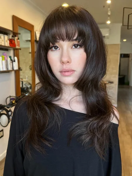 Long Dark Wavy Hair with Full Blunt Bangs