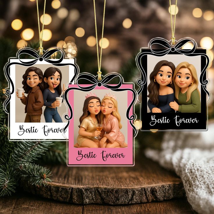 This may contain: three personalized christmas ornament hanging from a tree