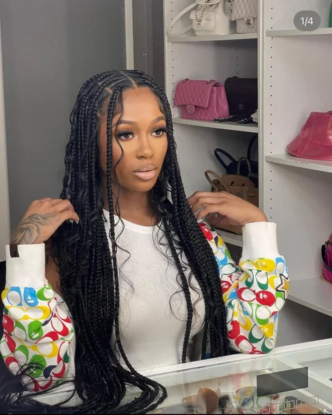 Medium-Large Black Knotless Braids with Wavy Ends