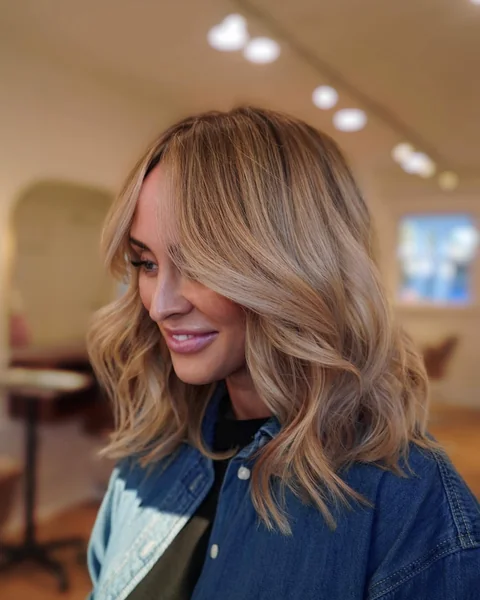 Voluminous Warm Blonde Waves Over 50