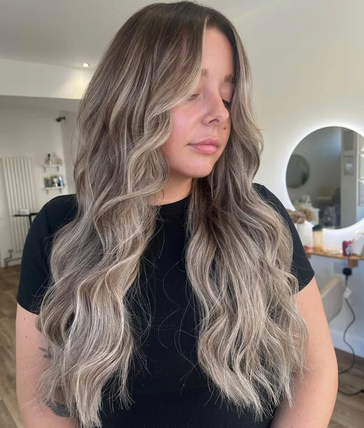Ash Blonde Waves with Soft Face-Framing Layers