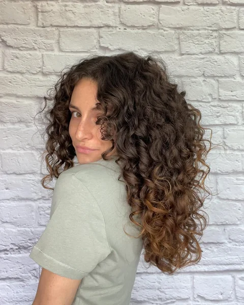 Bouncy Brunette Corkscrew Curls with Dimension