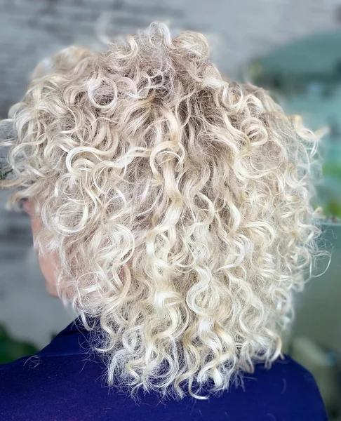 Bright Platinum Blonde Coils with Defined Volume