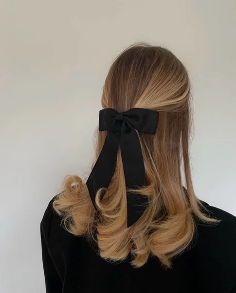 Chic Half-Up with Classic Black Ribbon Bow