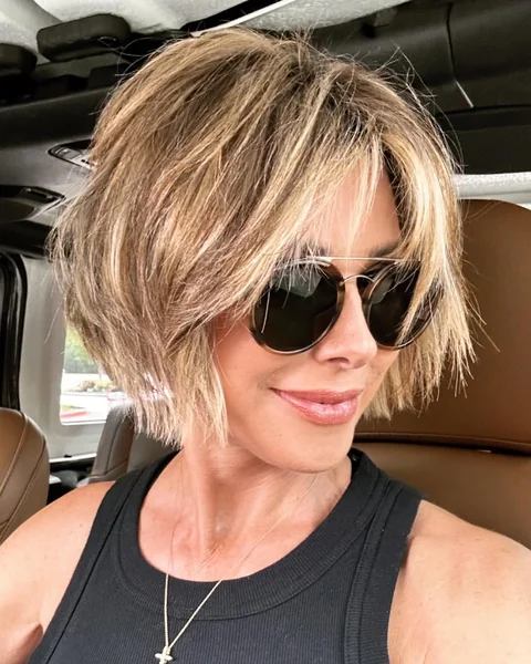 Choppy Blonde Chin Bob with High Volume